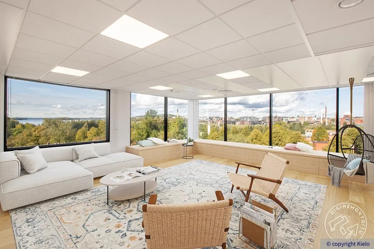 36Hatanpää digiremontoitu avotoimiston lounge-alue, jossa vaaleita luonnonmateriaaleja ja isot ikkunat kahteen suuntaan.