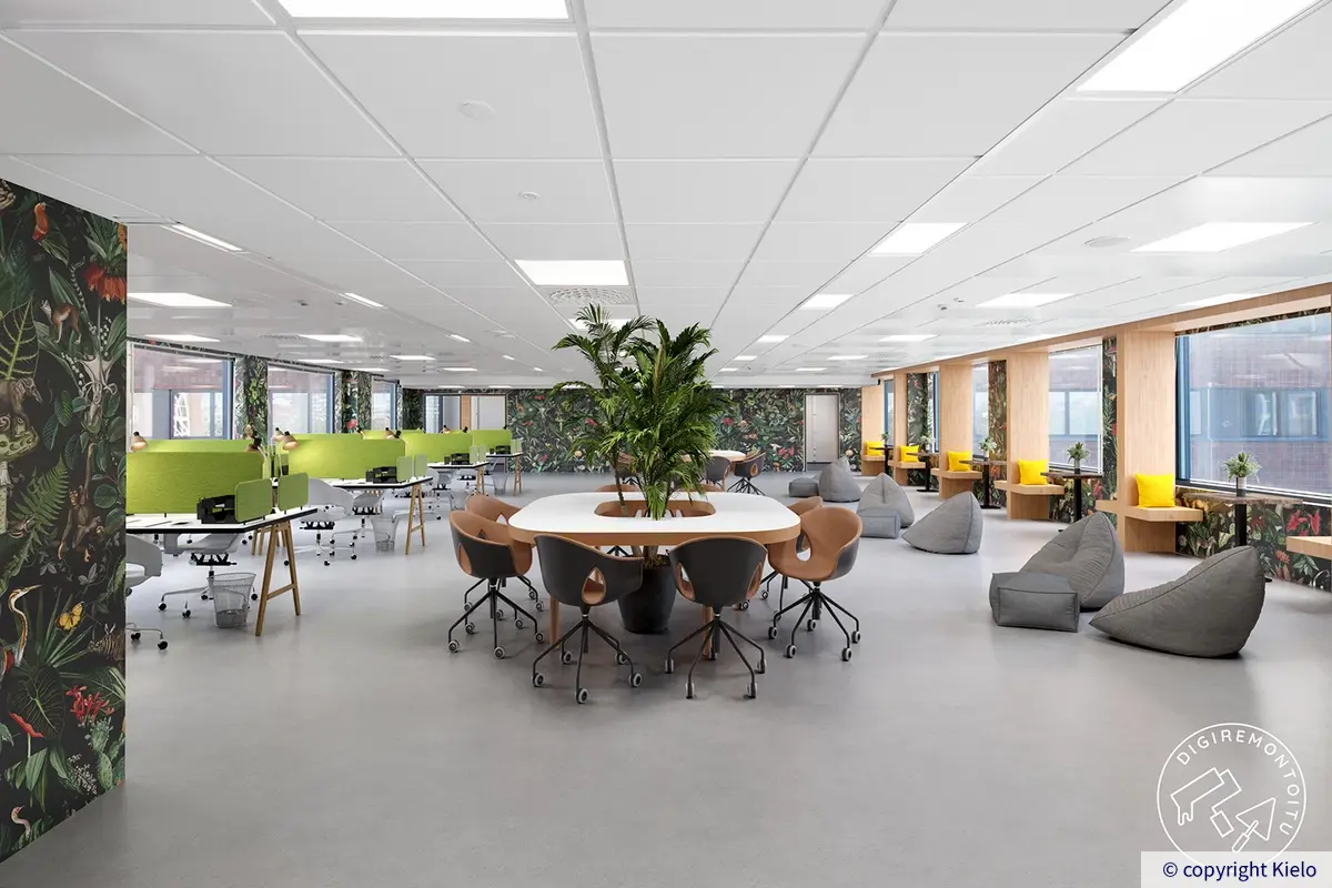 Digiremontoitu, värikkäästi sisustettu 36Hatanpää avotoimisto, jossa työpisteitä ja vapaamuotoisempaa työtilaa.
